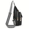 Black PU leather crossbody bag with an adjustable patterned strap.