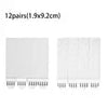 Twelve pairs of removable adhesive picture hanging strips measuring 1.9x9.2cm.