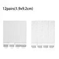 Twelve pairs of removable adhesive picture hanging strips measuring 1.9x9.2cm.