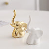 Gold and white ceramic elephant and rabbit jewelry holder desk ornament
