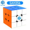 A cube puzzle with orange and white magnetic pieces, labeled GAN356.