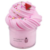 Pink scented slime in a jar with a strawberry decoration
