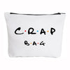 A white zippered pouch with black text that reads CRAP BAG