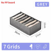 Grey foldable closet organizer box with seven grids for storing underwear, socks, and accessories