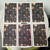 A set of twenty oracle cards featuring dark, ornate designs and gold accents.