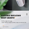 A white wall-mounted disposable toilet brush set with a refill head is shown cleaning a surface.