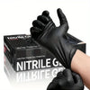 A hand wearing a black disposable nitrile cleaning glove is shown holding up the glove.