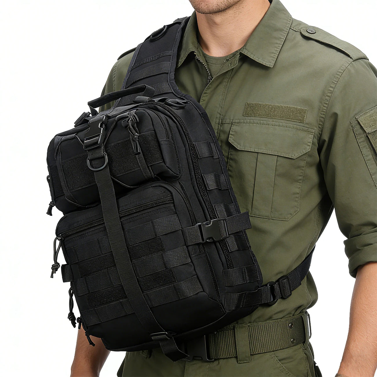 A person wearing a olive green shirt is carrying a black Crossbody Chest Bag with multiple zipper compartments and a MOLLE sy