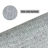 Close-up view of a gray irregular pentagram rug with a non-slip bottom texture.
