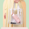 A hand holds a mini capsule umbrella in a clear case, demonstrating its convenience for going out.