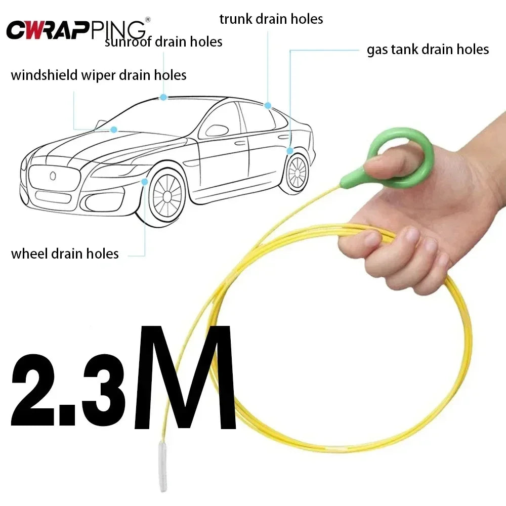 A yellow flexible brush with a green loop is shown next to a car diagram illustrating various drain holes.