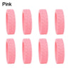 A set of pink silicone luggage wheel protectors designed to prevent scratching and reduce noise during travel.
