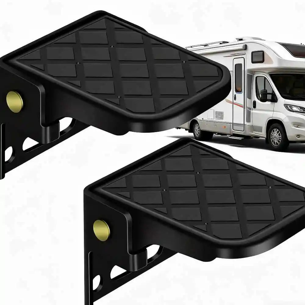 A pair of black folding truck bed steps mounted on a vehicle, shown in close-up.