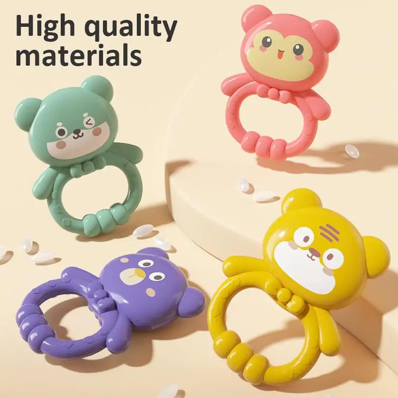 Three colorful rubber toys shaped like bears are displayed on a light background.