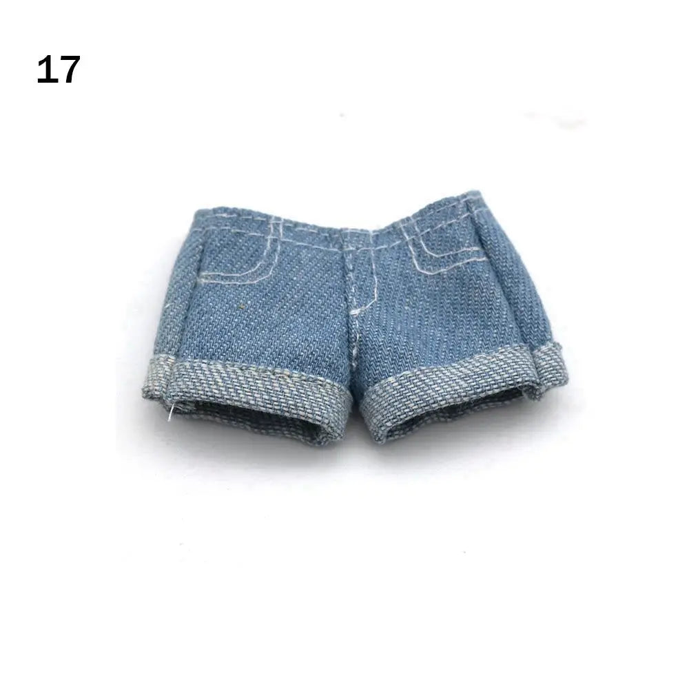 A pair of denim-style shorts for a fashion doll clothing set.