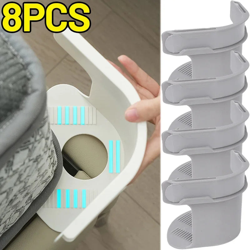 Eight clear plastic clips used to tighten and secure the corners of a bedsheet or sofa cover.