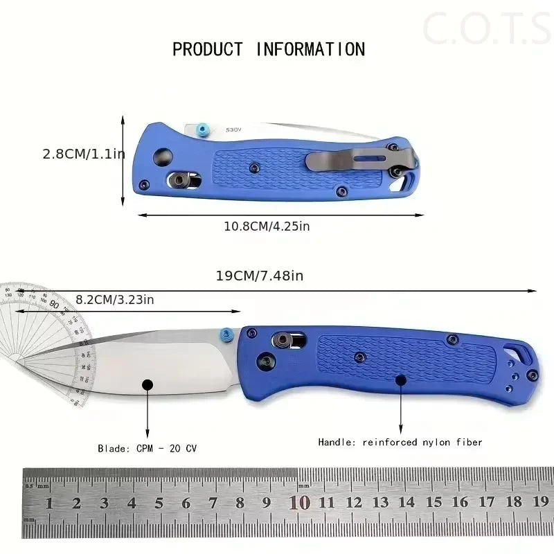 A blue ultralight EDC folding knife with a drop point blade shown next to a ruler.