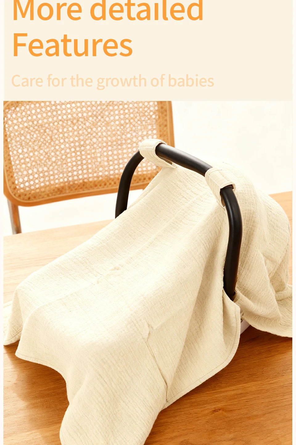 A beige breathable cotton muslin car seat and stroller cover draped on a wooden surface.