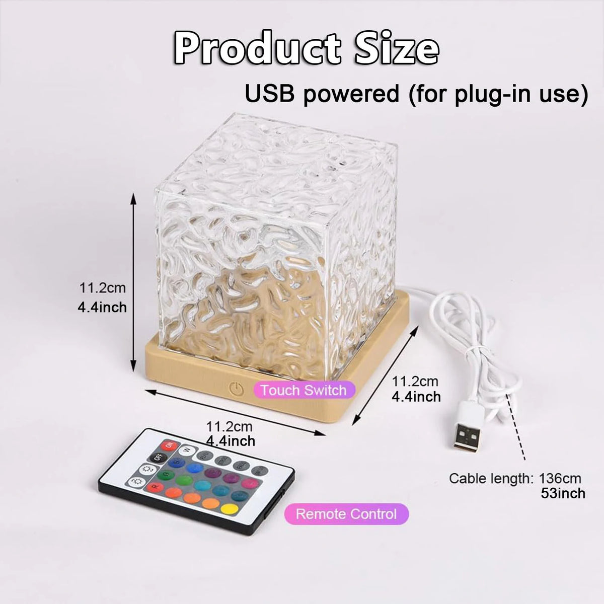 A clear cube-shaped USB powered night light with a touch switch and a remote control for plug-in use