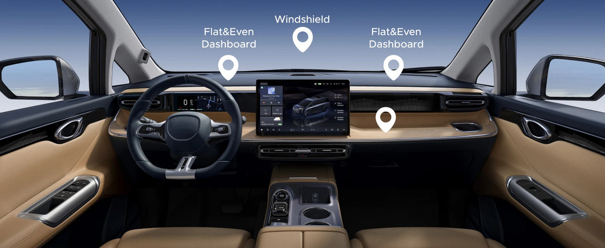 Interior view of a car showing a magnetic phone mount and dashboard suction cup features.