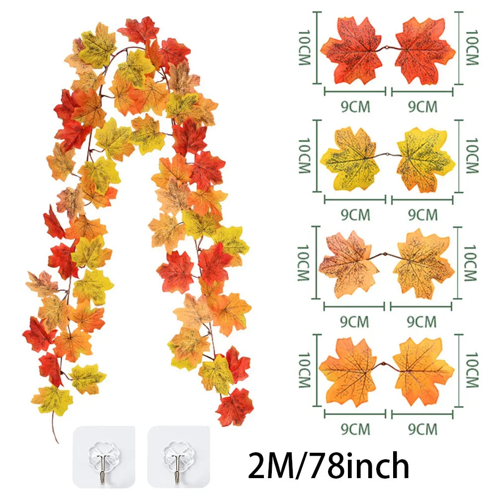 Artificial maple leaf garland in autumn colors, featuring red, orange, and yellow leaves on a vine.