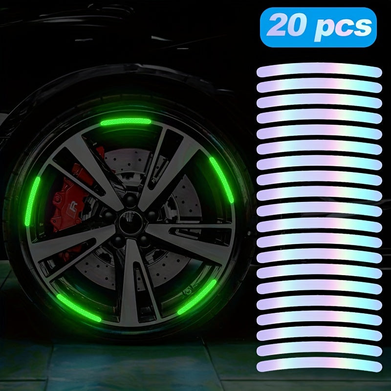 A close-up of a car wheel with bright green reflective stickers installed on the rim.