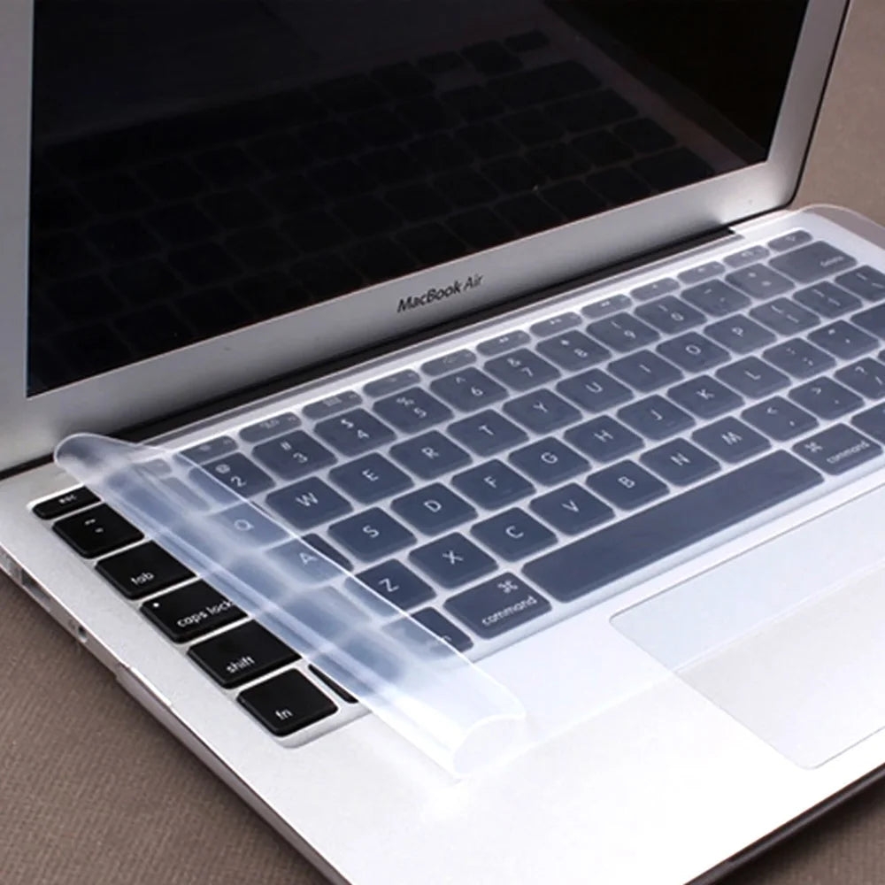 Clear silicone keyboard cover for a MacBook Air laptop keyboard.