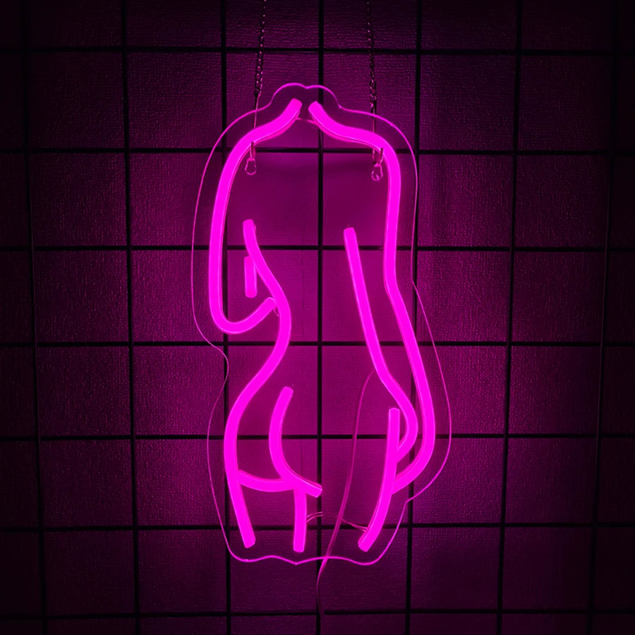 A neon sign shaped like a female silhouette is displayed against a dark purple grid background.