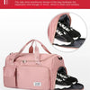 Pink travel duffel bag with a side independent shoe warehouse design showing separated shoes inside.