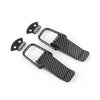 A set of black carbon fiber rear trunk locking buckles and corresponding hardware for cars.