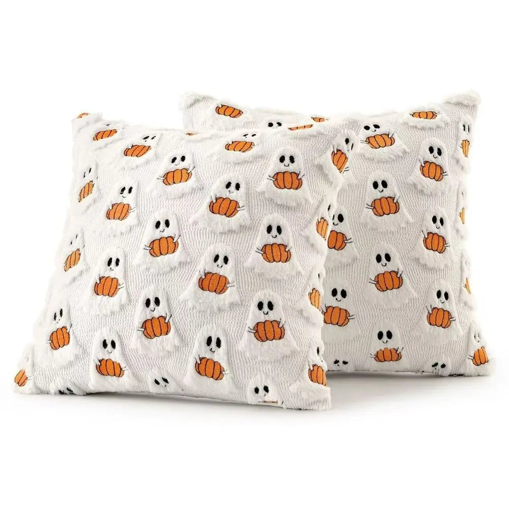 White throw pillow cover featuring a repeating pattern of orange Halloween ghosts with pumpkins.