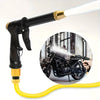 A black high-pressure car wash gun with a yellow hose and gold nozzle is shown next to a motorcycle.