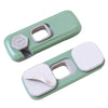 A light green child safety cabinet lock device with a removable white cover and a 360-degree indicator.