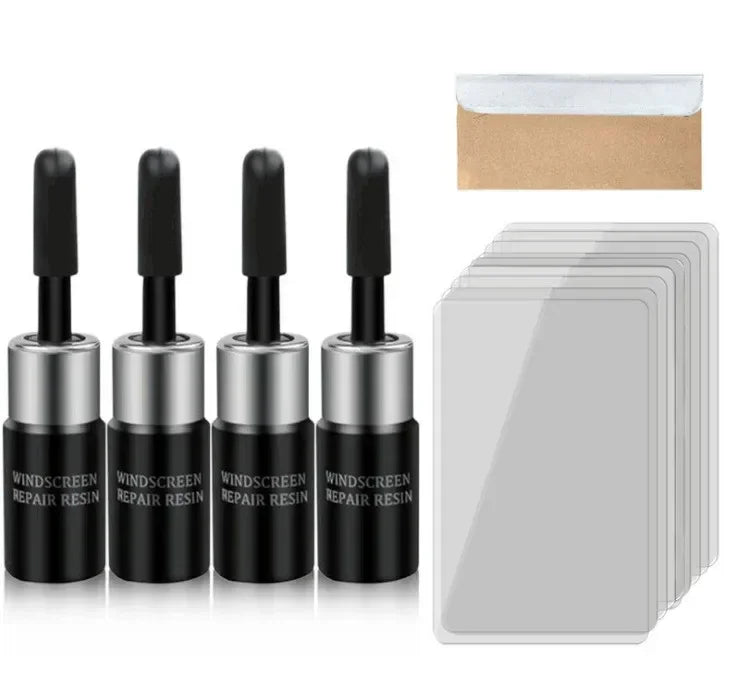 A set of black and silver windshield glass repair resin kits with a cardboard envelope.