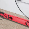 Red magnetic rechargeable COB work light with a hook and cable shown next to a laptop and power bank.