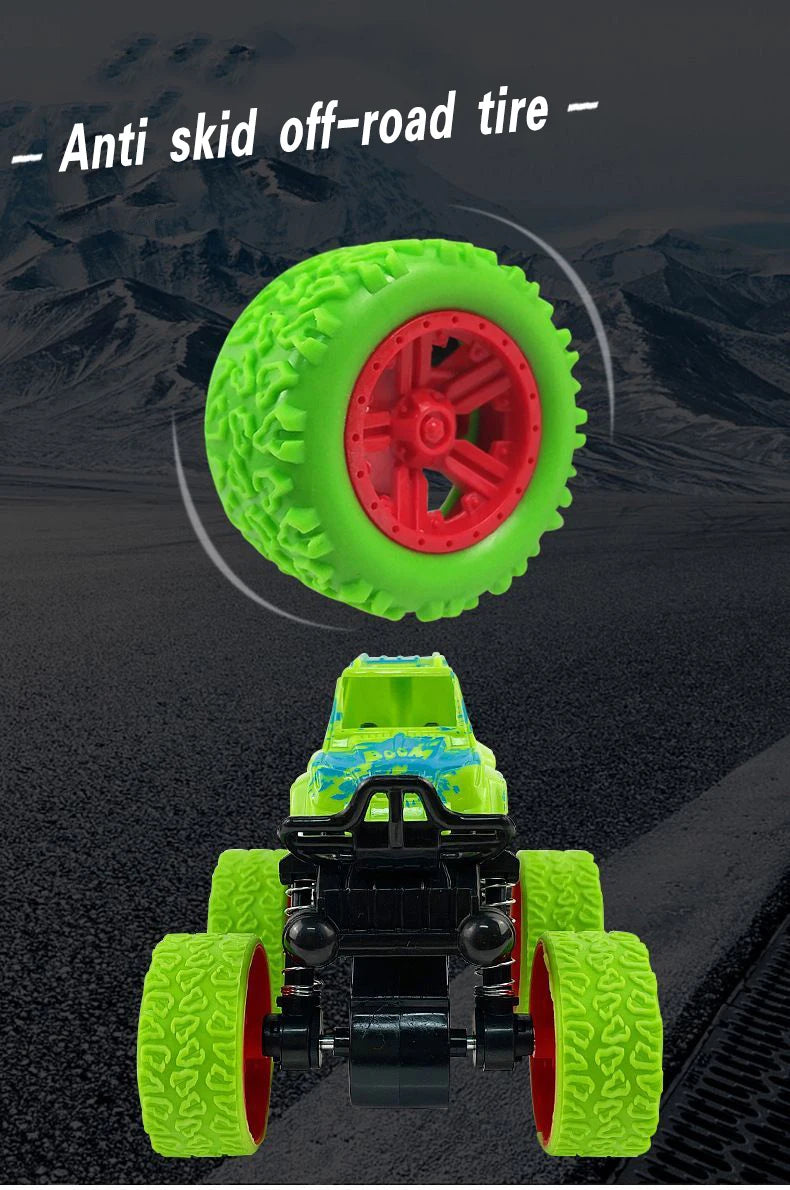 A bright lime green off-road tire is shown above a yellow and green stunt car with four wheels.