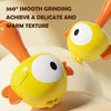 A yellow cartoon animal baby rattle toy with orange accents shown in a close-up view.
