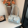 Bolso de hombro suave con detalle de lazo
