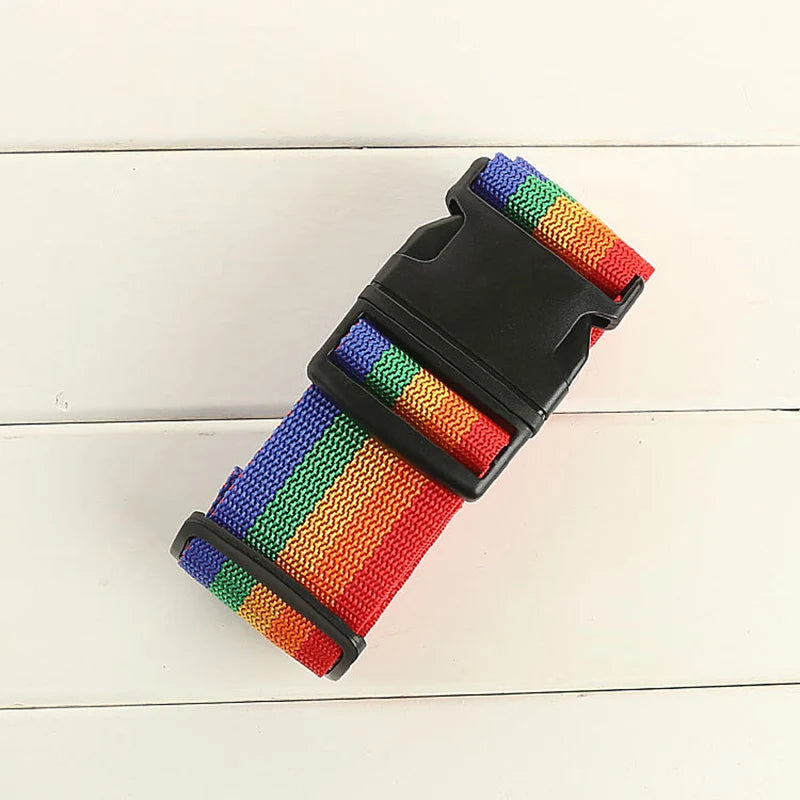 Adjustable polyester luggage strap featuring a rainbow color pattern on a black strap.