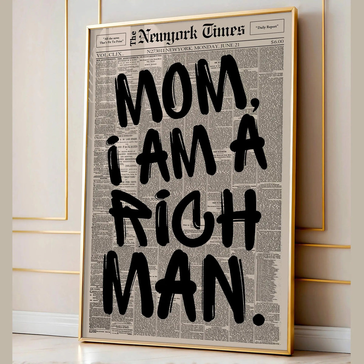 Framed canvas wall art featuring a vintage newspaper style quote: Mom, I am a rich man.
