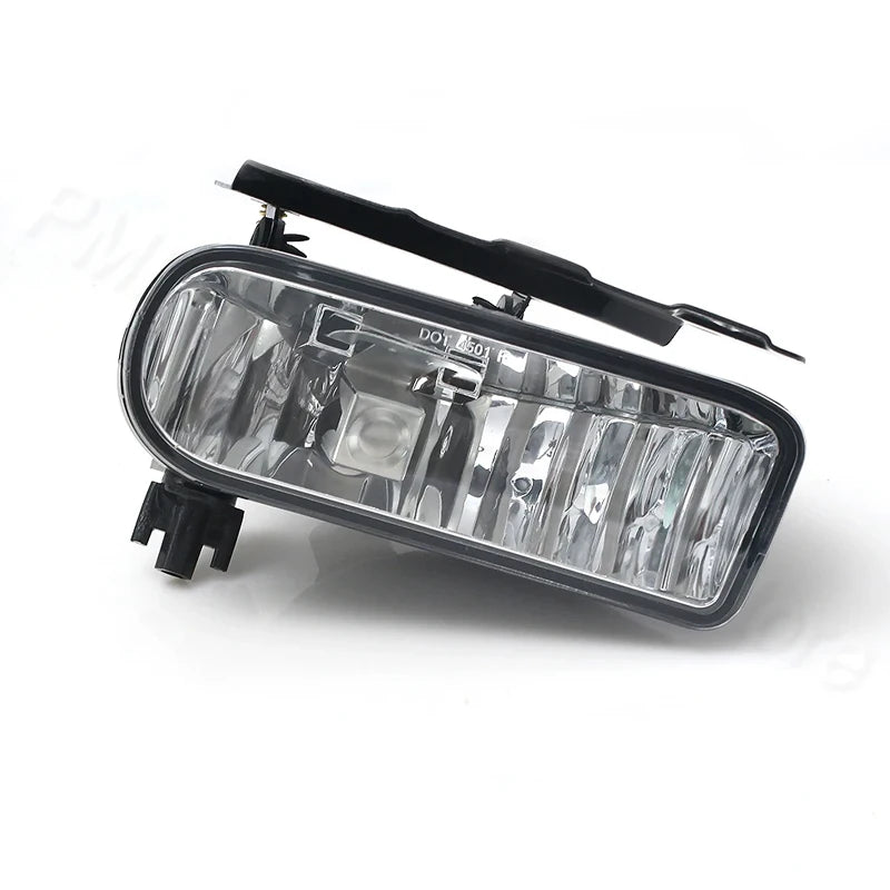 Headlight assembly for Cadillac Escalade featuring clear lenses and bulbs.
