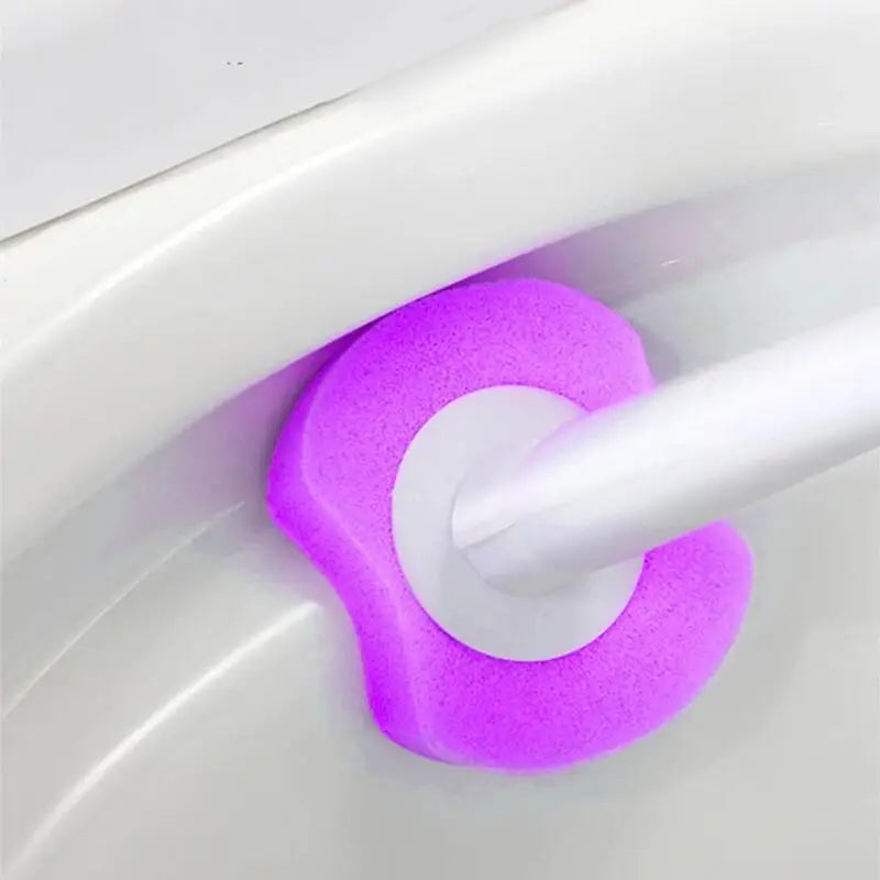 A purple disposable toilet cleaning pad is shown being used inside a white toilet bowl.