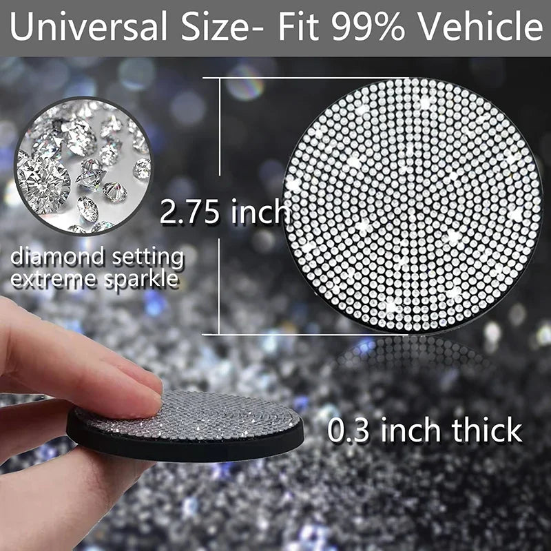 A close-up view of a round, black non-slip coaster with a diamond setting texture, showing its thickness and sparkle.