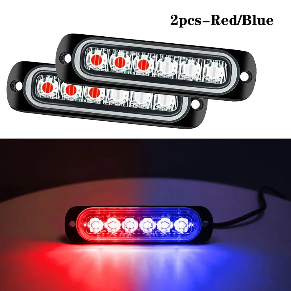 Two LED strobe side marker lights, red and blue, showing their illumination.