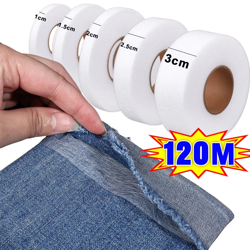 A hand is unwrapping a roll of white double-sided iron-on fabric adhesive tape, showing various tape widths.