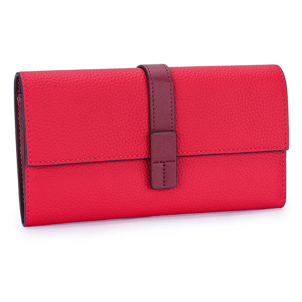 A vibrant red women's cowhide leather bi-fold wallet with card slots and a strap detail.