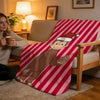 A cozy high-density short plush throw blanket featuring a cartoon monkey design on a red and white striped background.