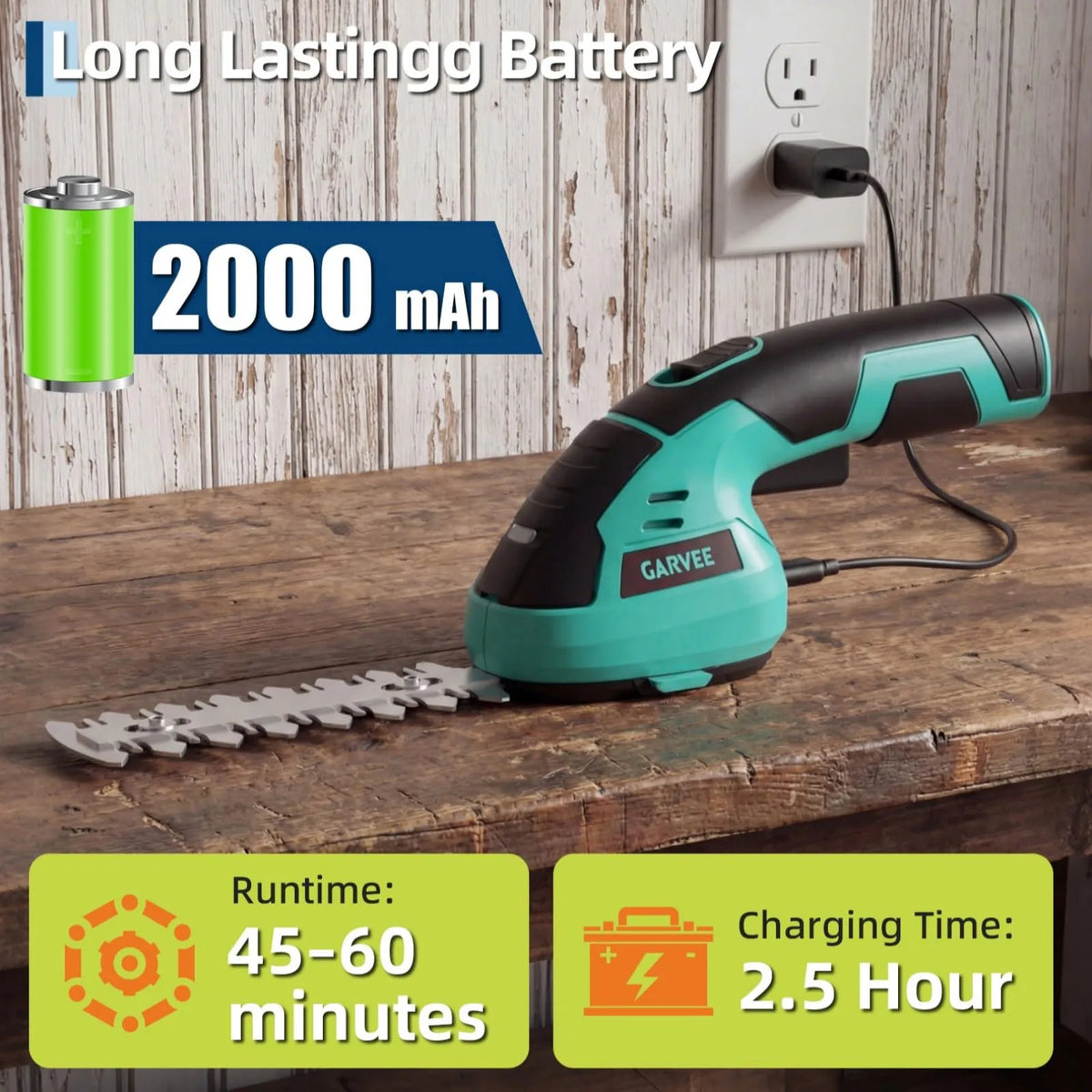 A green and black cordless grass shear and shrub trimmer with a battery and blade on a wooden surface.