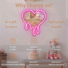 A neon sign shaped like a melting heart is displayed on a wall, with text describing its features for gifting and décor.