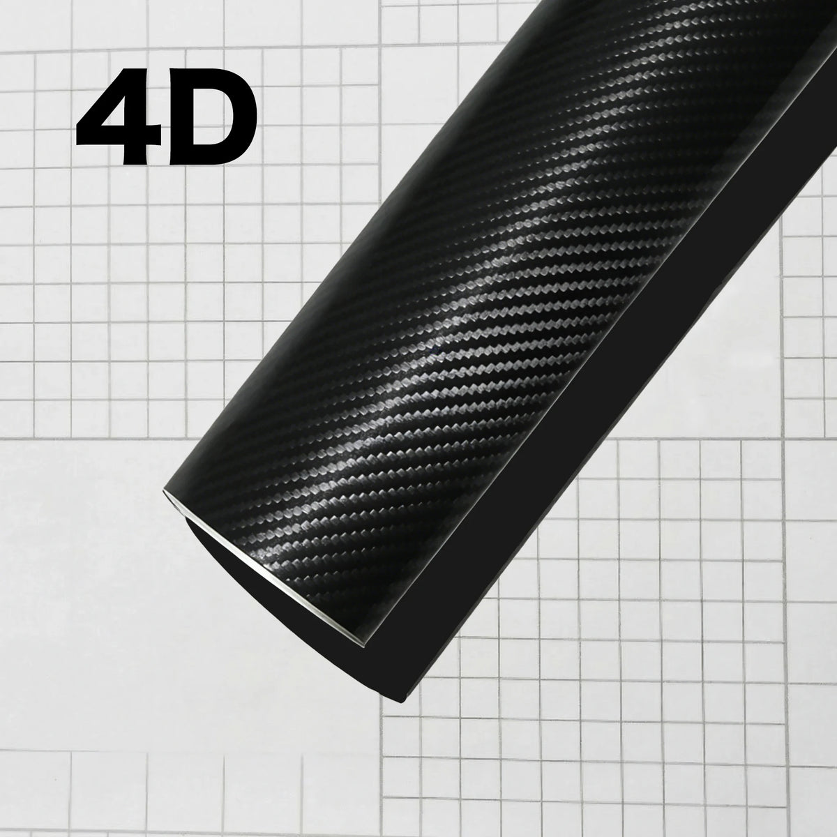 A close-up view of a black carbon fiber vinyl wrap film displaying a textured pattern on a grid background.